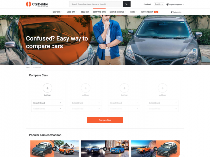Screenshot of the Compare Cars page from the Cardekho website.